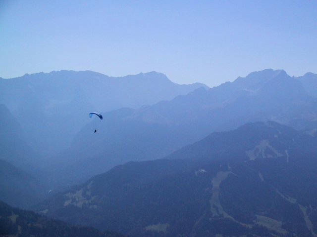 At the mid-way cafe we caught our first glimpse of what soon became a swarm of parasailors.