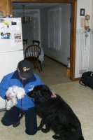 And Clay was immediately curious.  Who's this dog in *my* dad's arms?