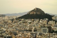 The hill of Likavitos. At 263 meters, it is the highest point in Athens. Atop it stands a small white Cycladic-style church, built in the last 200 years.