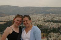 Rosie & Laura pose for a picture with the city of Athens as a backdrop.