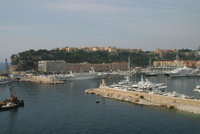 Monaco harbor by day.
