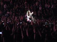A rare moment, I caught him facing our way.  It seemed they spent nearly all the time on the catwalk facing stage left or straight on, which meant their backs were always to us. 