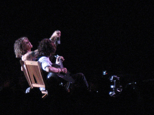 Tyler and Perry set up some chairs out on the catwalk for an accoustic 
