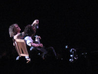 Tyler and Perry set up some chairs out on the catwalk for an accoustic 