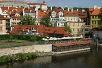 At the water's edge is the restaurant we'd made reservations with for our first night in Prague.