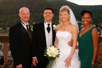 The couple with their maid of honor and best man