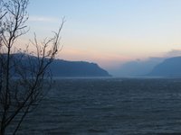 The Columbia river at sunrise.  Washington cliff on left, Oregon cliff on right.