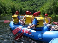 Shortly after this shot we hit our second stretch of rapids, where my oar caught a rock during a stroke and I was yanked out of the boat.  I grabbed the line around the outside of the boat and held on until the gang pulled me back in, no worse for the wear, but a bit soggy. ;-)