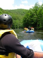 We peer over Tony's shoulder hoping to get a glimpse of the rapids ahead. 