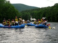 Each boat was equipped with two buckets, but as seen here, sometimes the bucket would slip out while throwing the water. Then it became the property of whomever retrieved it.