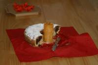 Half of my birthday cake.  A traditional marble cake with cherries, baked fresh by Katze.  In the center she place a nice beeswax candle.