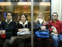 Regan was sitting across from us on this tube ride home Sat night and decided to snap a  picture of the rest of us.  From left: Greg, Laurel, Me, and Norm.