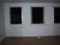 The living room of my new apartment.  The windows overlook the Hauptstrasse.