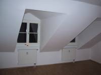 The windows of my bedroom, directly above the living room.  These windows also overlook the Hauptstrasse.