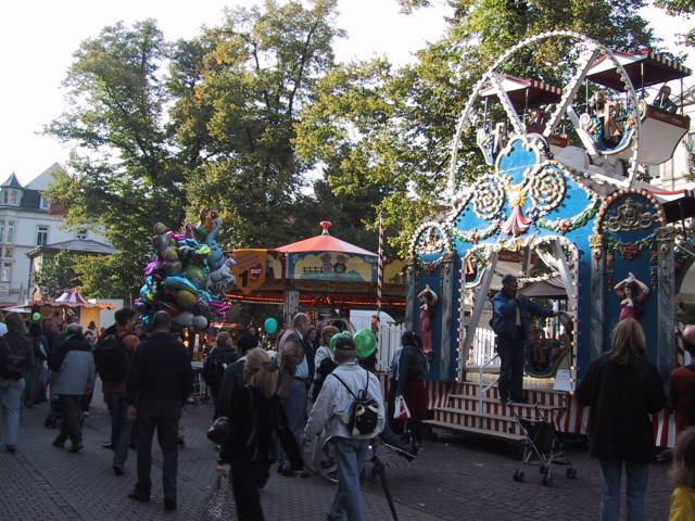 Booths and kiddie rides.
